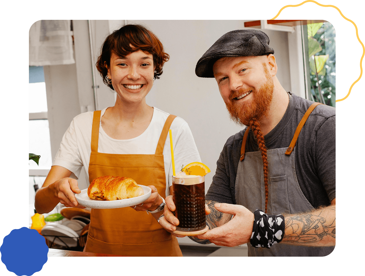 Smiling restaurant owner couple holding food
